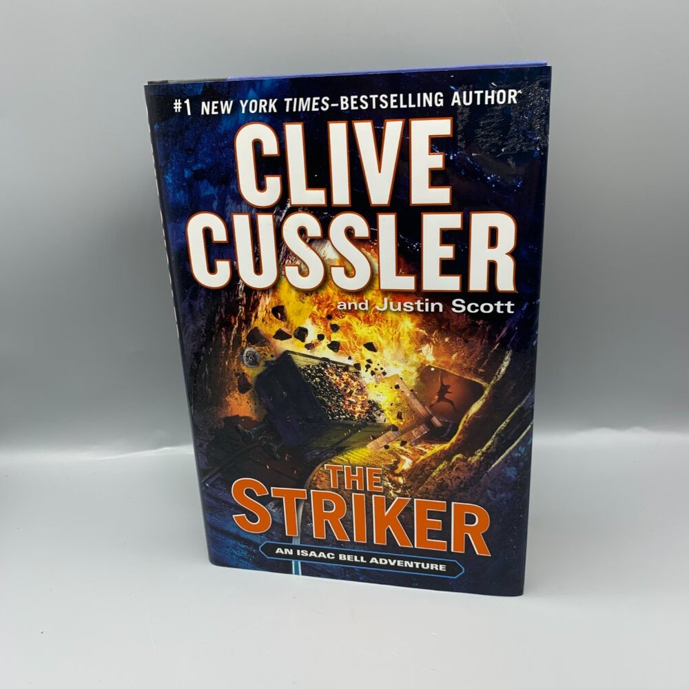 The Striker (An Isaac Bell Adventure) Hardcover Mystery Novel by Clive Cussler